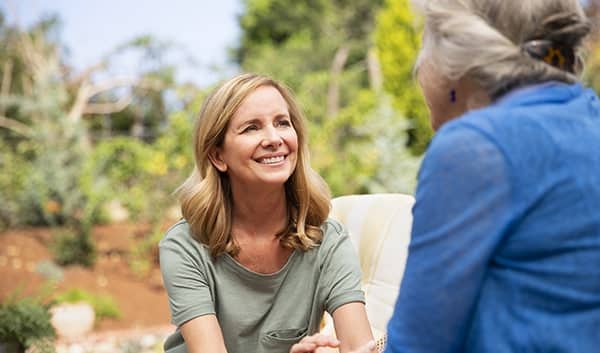 woman looking at mother