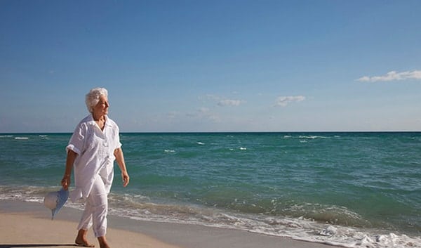 man walking on beach