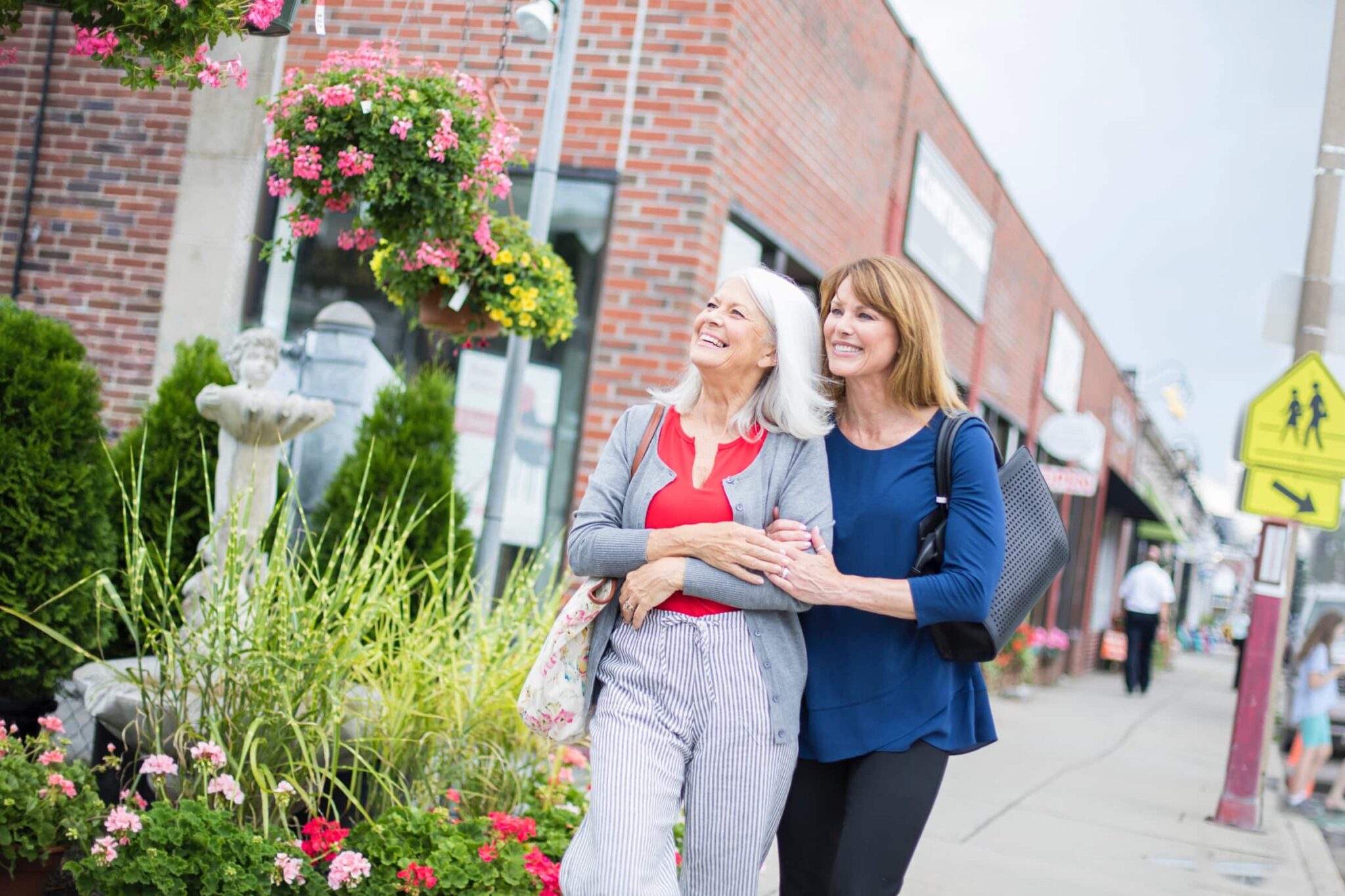 Woman and mother walking