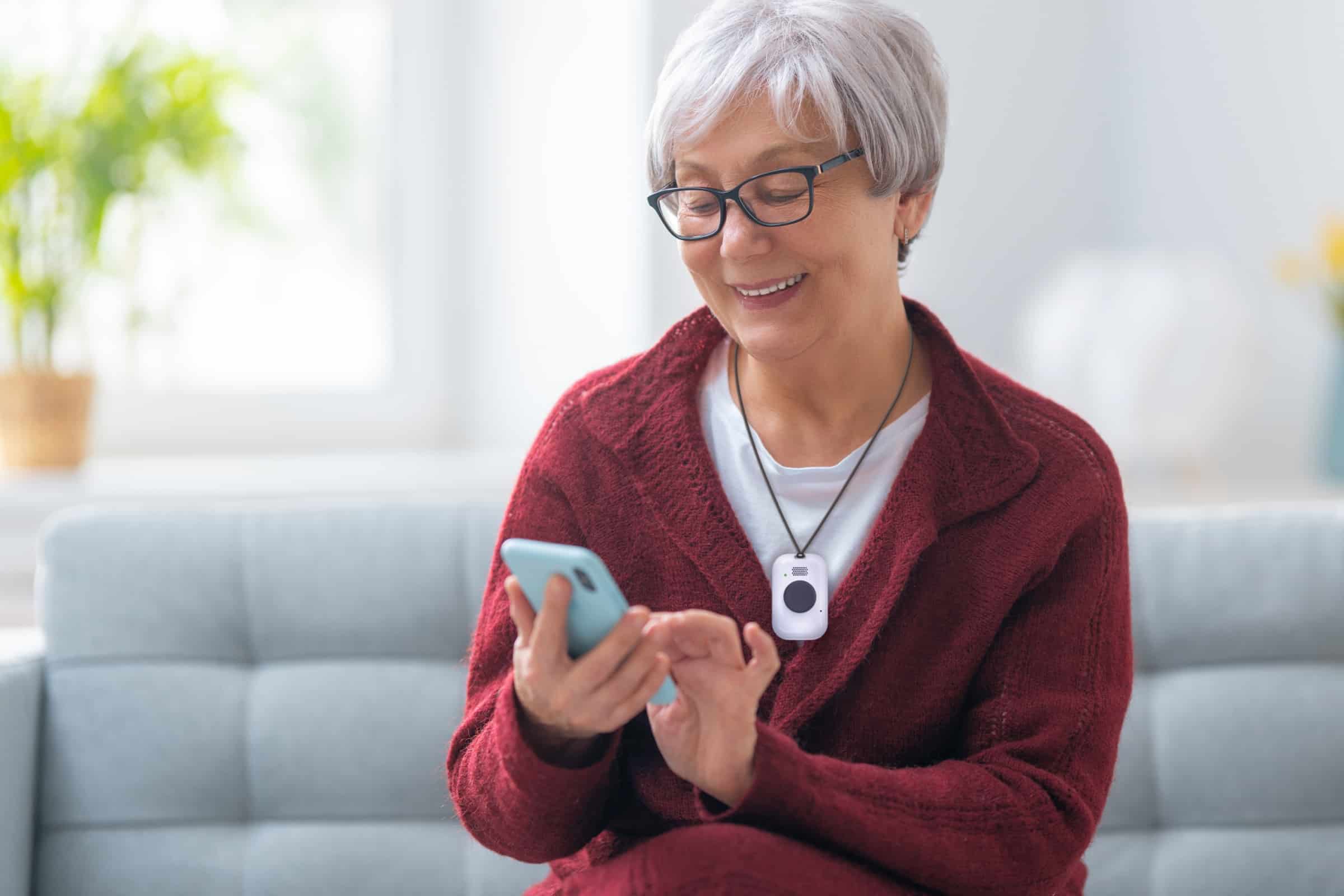 Woman looking at phone with On the Go