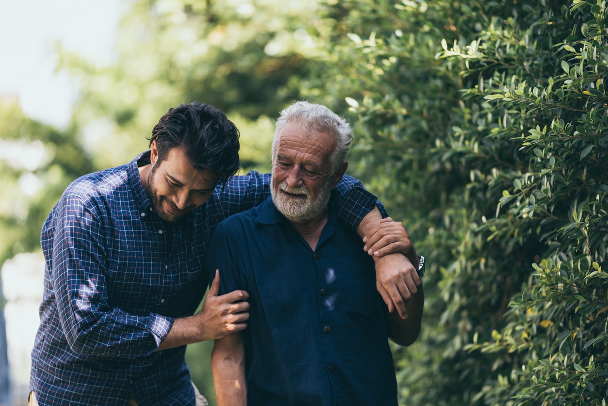 Man and son walking outside